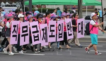 지난해 6월 30일 열린 비정규직 철폐 전국노동자대회에서 참가자들은 직무급제 도입을 반대했다. 사진=박은숙 기자