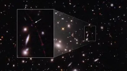 가장 먼 우주에서 발견된 단일 별 에렌델의 모습이 흰 화살표로 표시되어 있다. 사진=NASA, ESA, Alyssa Pagan(STSCI)