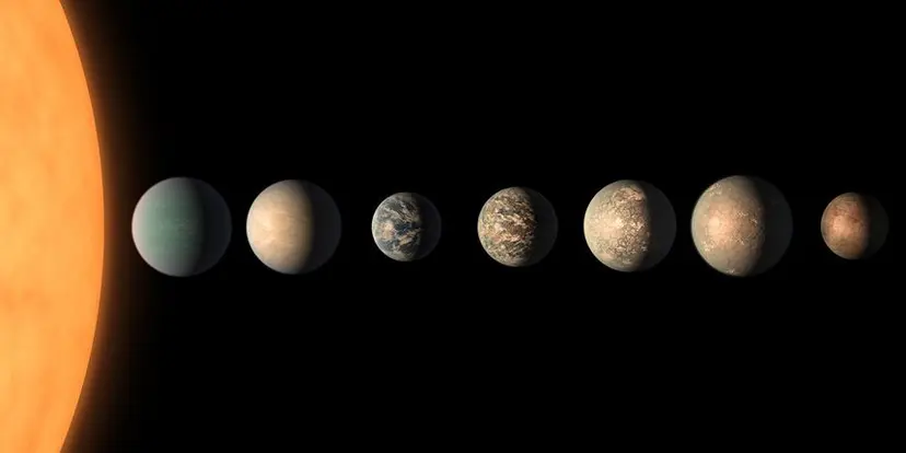 TRAPPIST-1 별 곁을 도는 외계행성들의 모습을 표현한 그림. 이미지=NASA